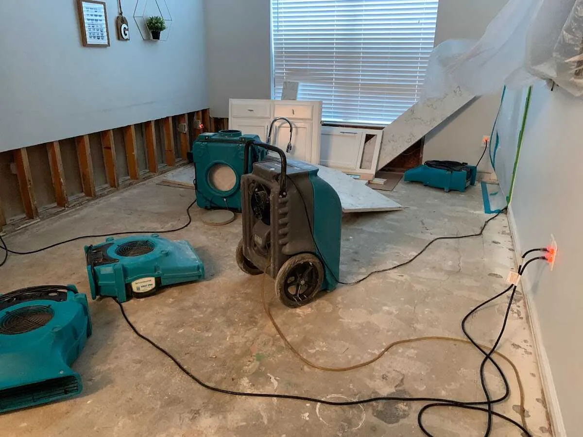 Dehumidifier in flood-cut room for Water Damage Restoration in Randolph